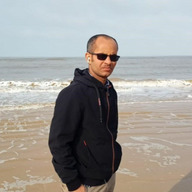 Picture of Workie Anley Zegeye wearing a black sweater and sunglasses.